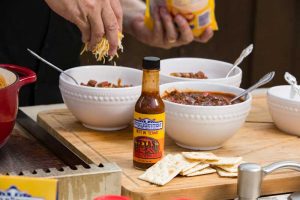 Serving the finished chili