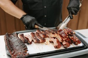 Slicing the baby back pork ribs