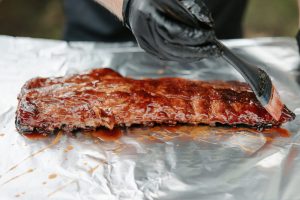 Glazing the baby back pork ribs