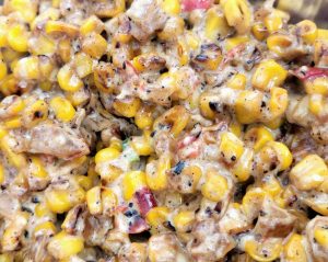 Mix the corn, mayonnaise, cheese and cream.