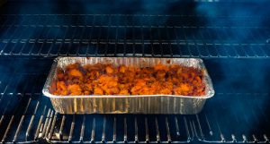 Sweet potatoes cooking on the Trager Grill